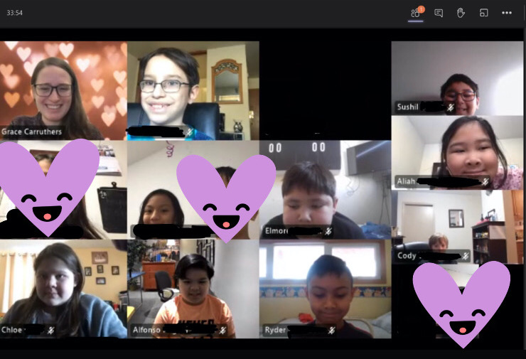 Students smile in a Zoom group screenshot