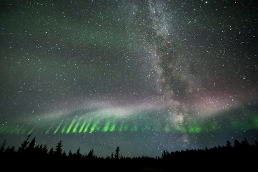 A clear STEVE lights the sky against the Milky Way