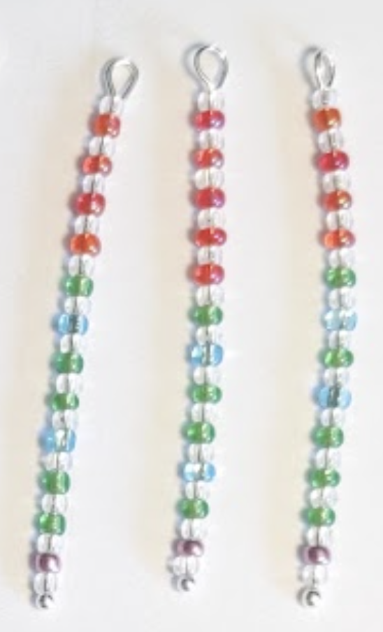 Head pins with colored beads on them